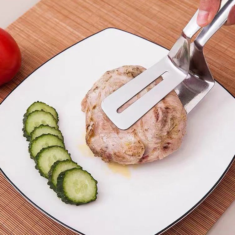pince-pour-cuisine-steak-plat